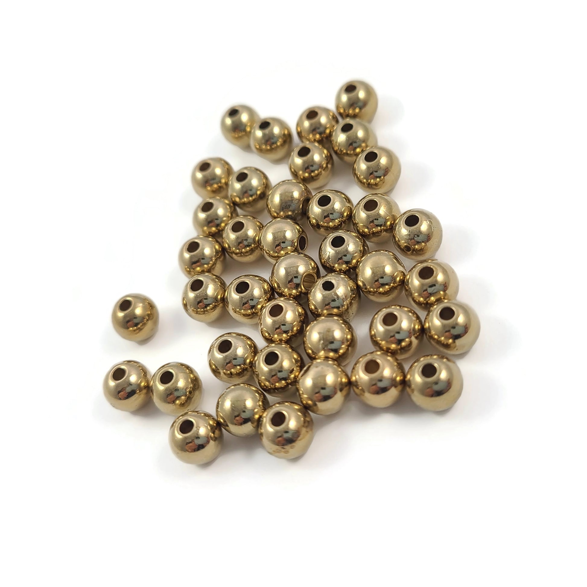 40 gold plastic spacer beads, 6mm