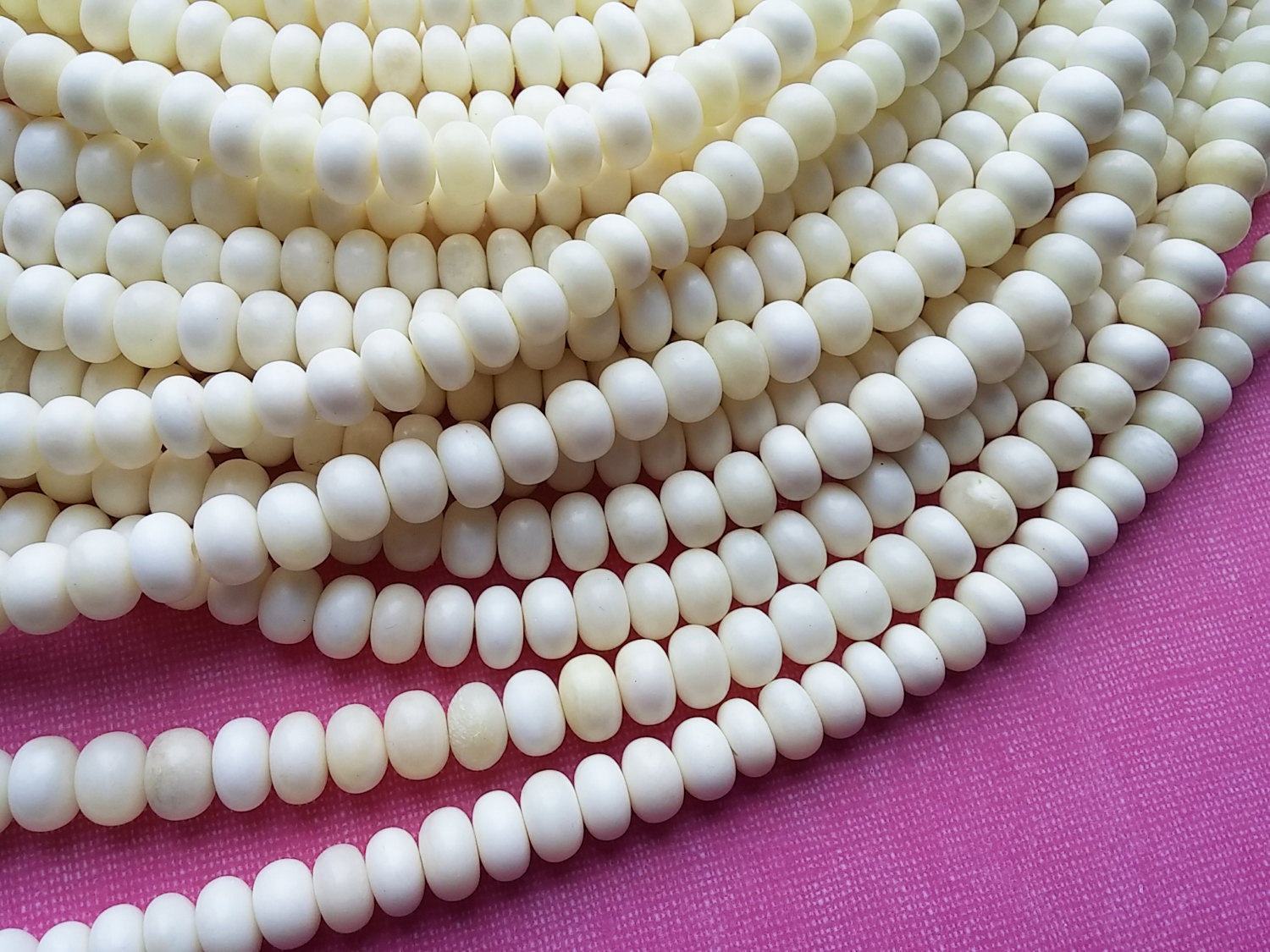 15 Perles rondelles en os naturel blanc 10mm