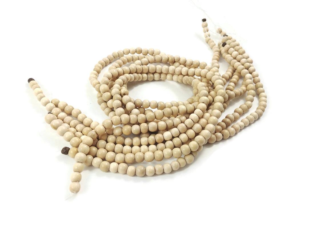 Whitewood 4, 6 or 8mm wood round beads 16 inch strand