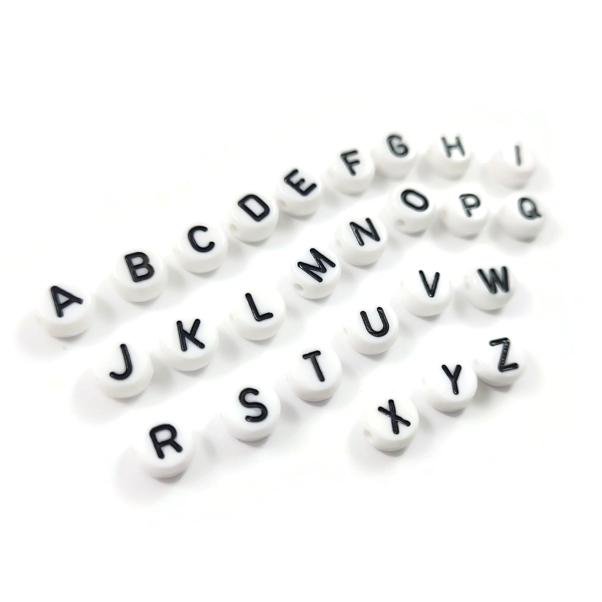 1 Black and white flat round letter bead