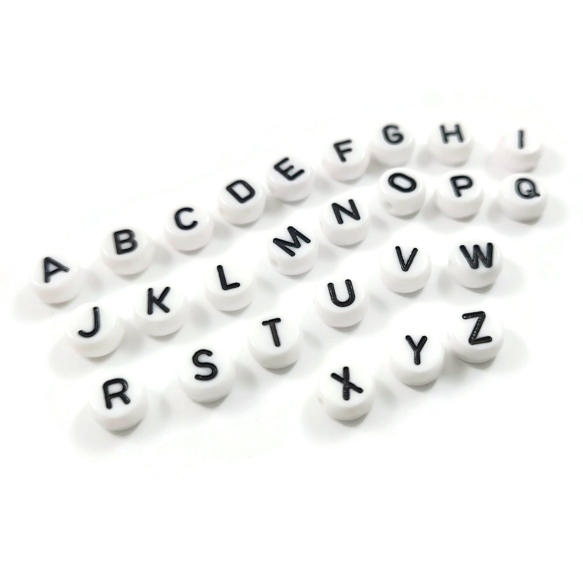 Black and white flat round letter beads