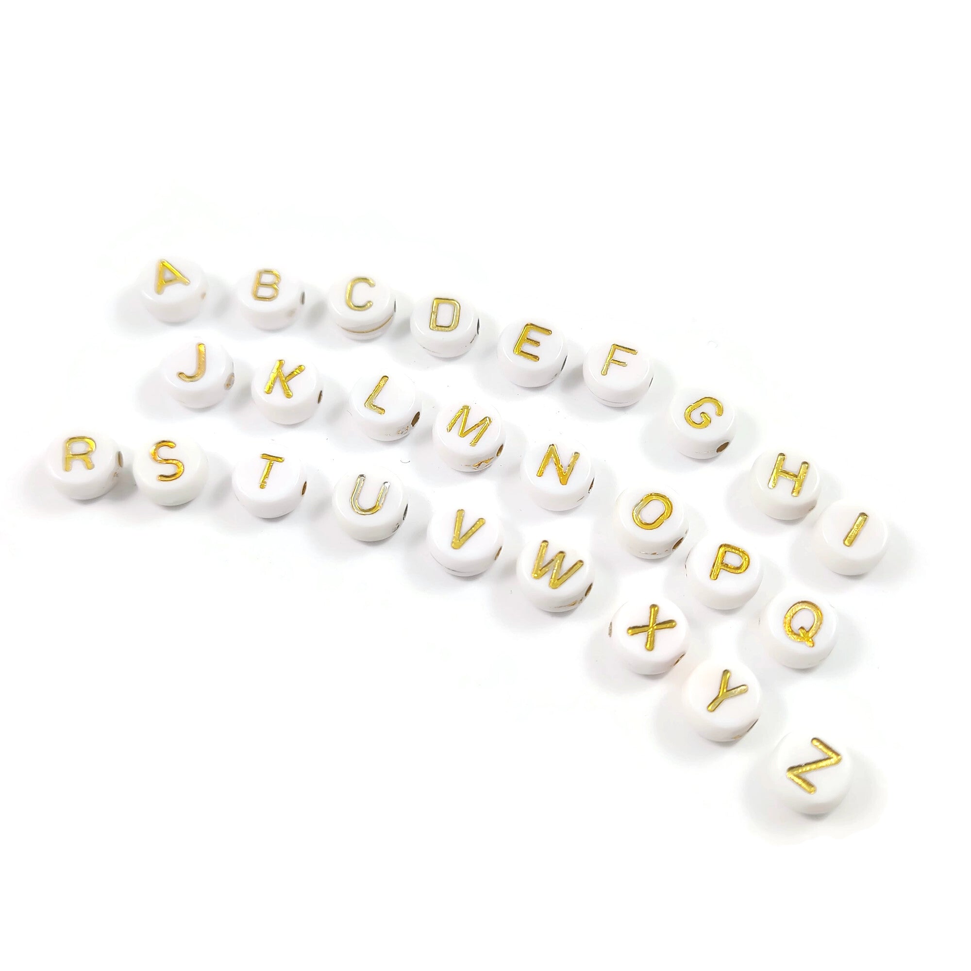 White and gold flat round letter beads
