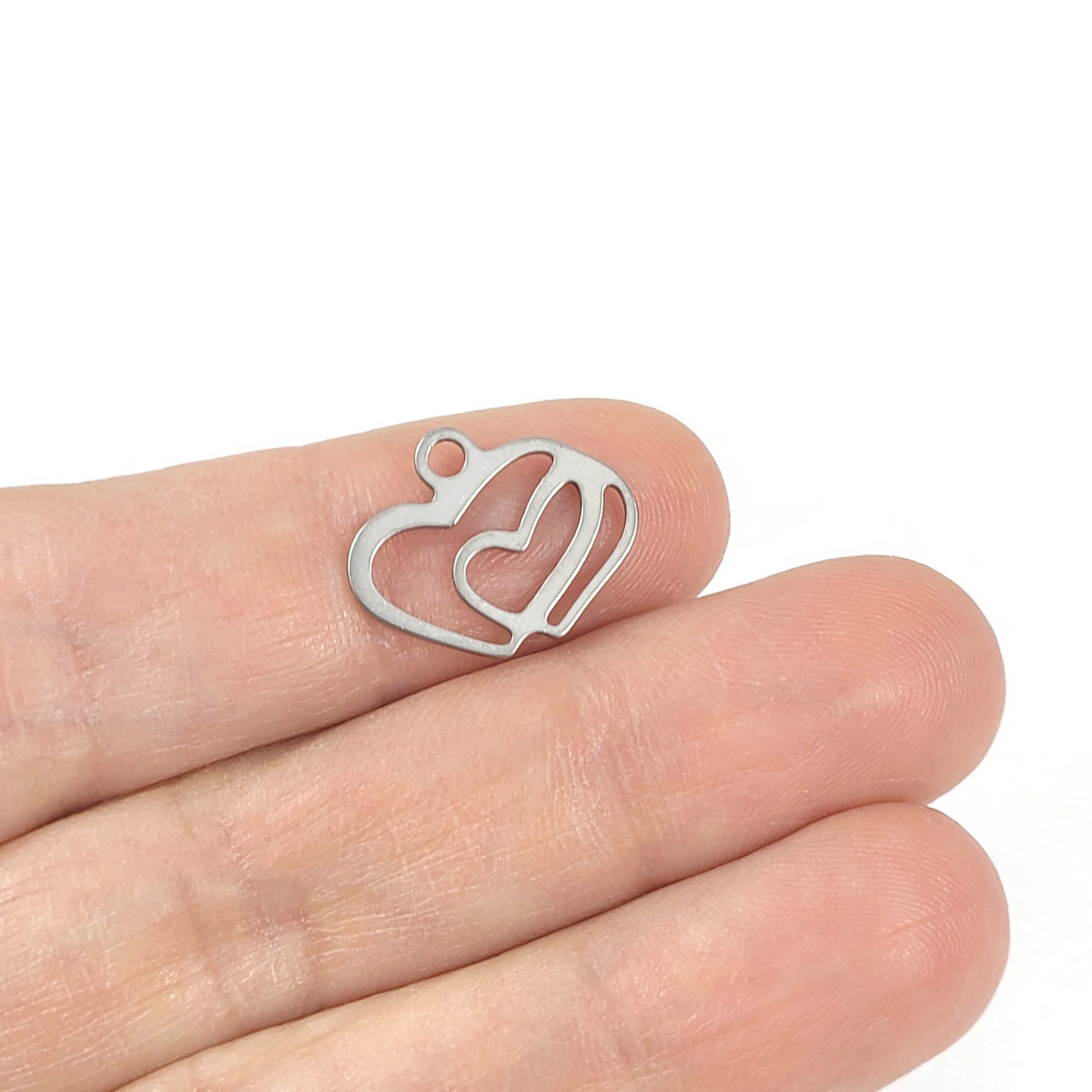 2 pendentifs double coeurs en acier inoxydable