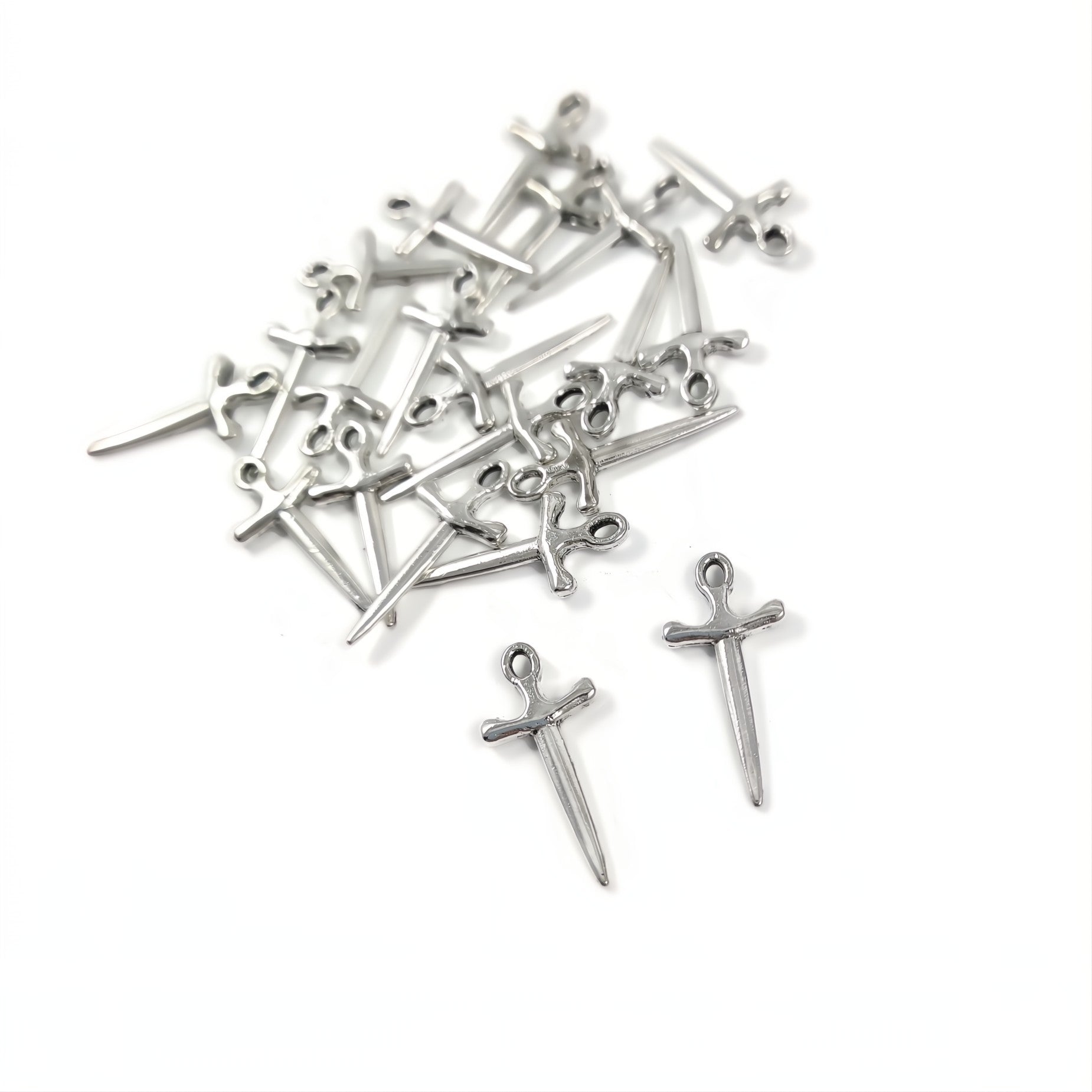 10 silver sword charms