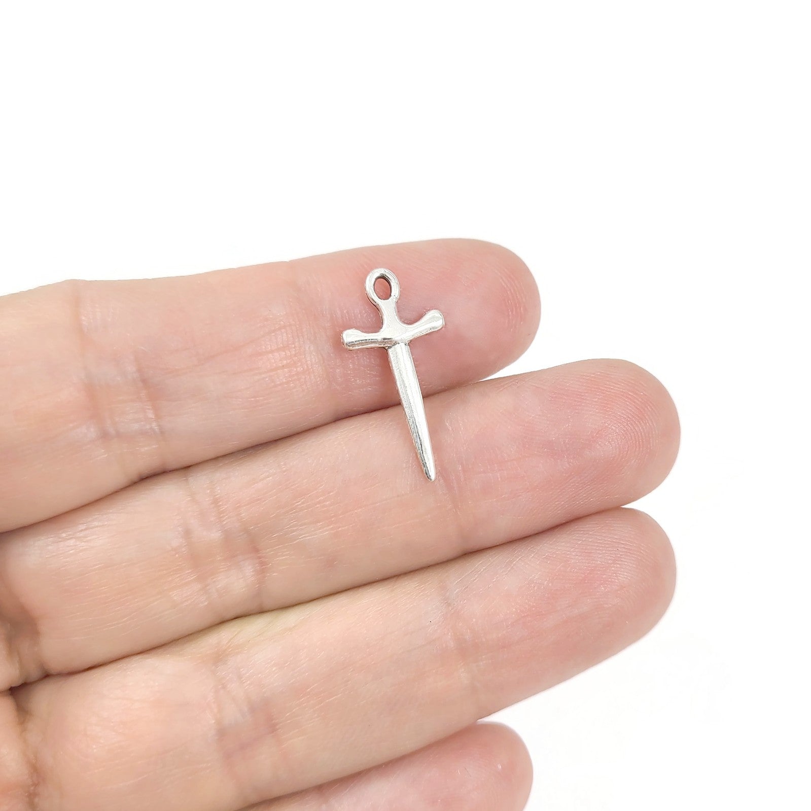 10 silver sword charms