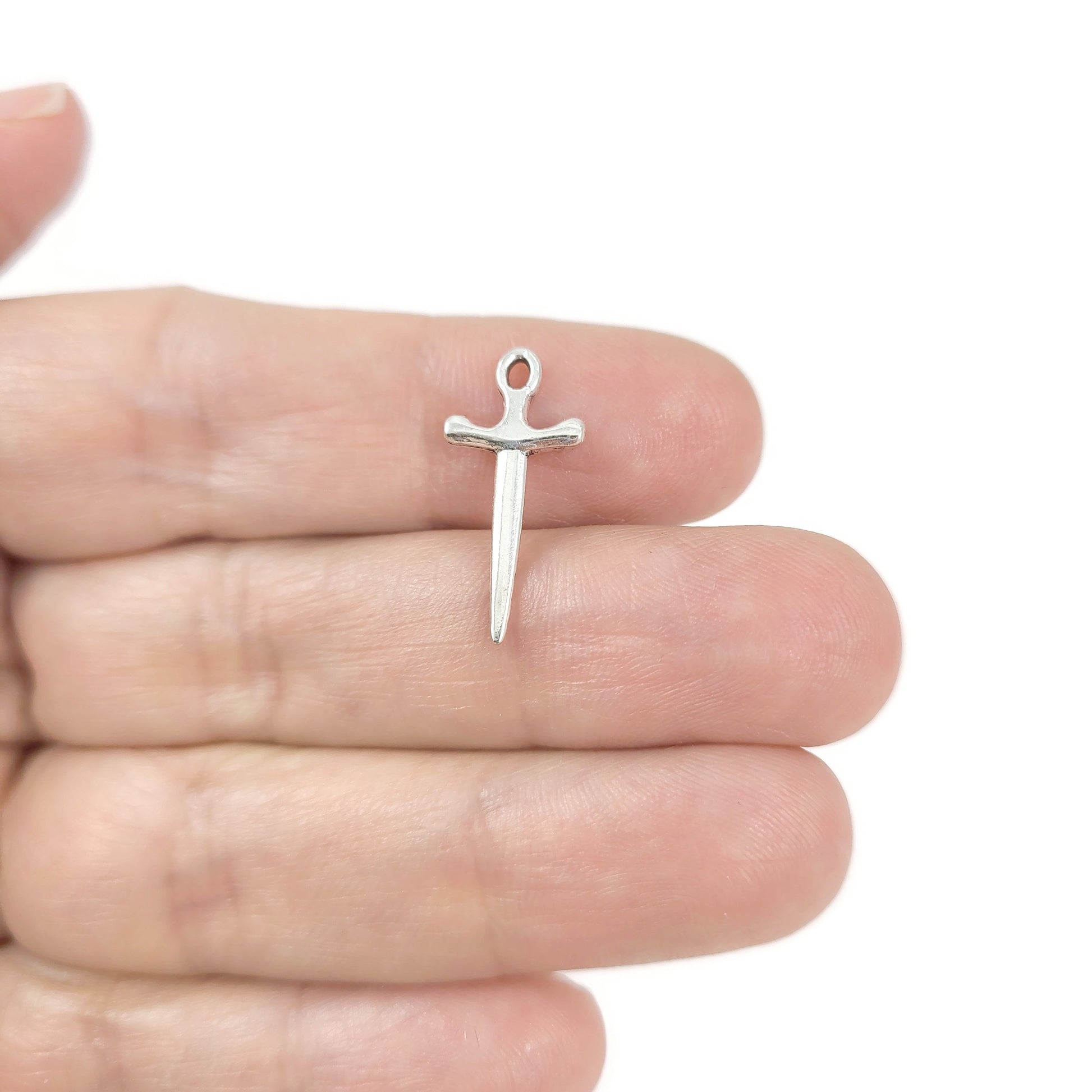 10 silver sword charms