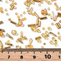 Golden glass seed bead grab bag, Mixed shapes