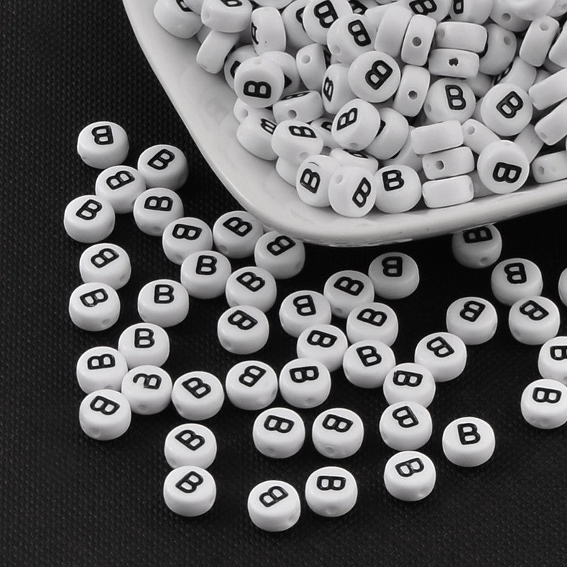 Black and white flat round letter beads