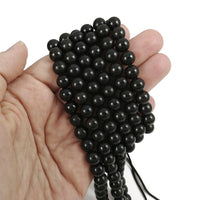 Perles rondes en bois noir 6mm, 8mm, 10mm