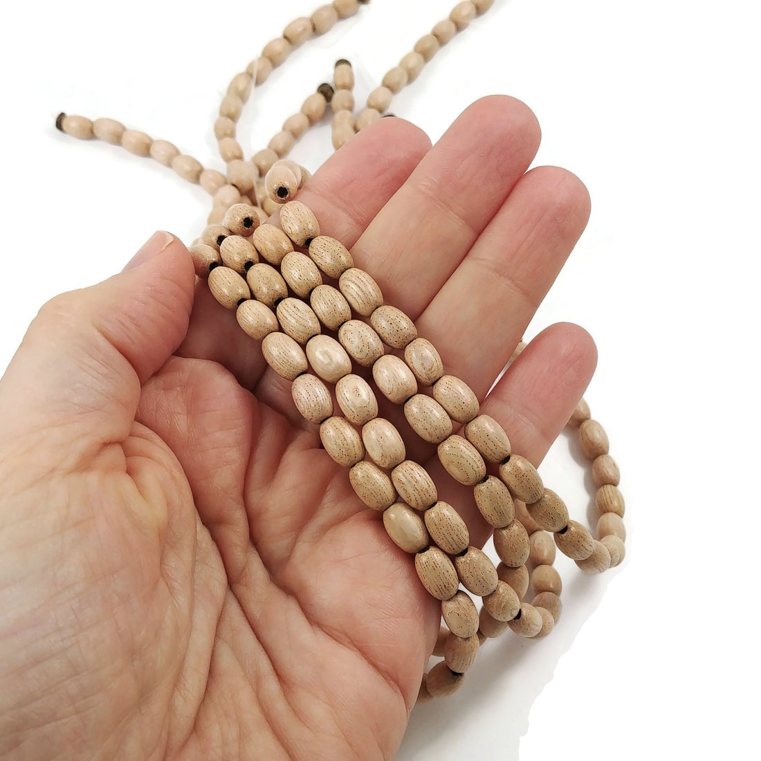 Perles ovales en bois de rose naturel 9x6mm
