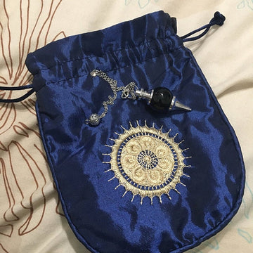 Satin pouch bag with gold sun