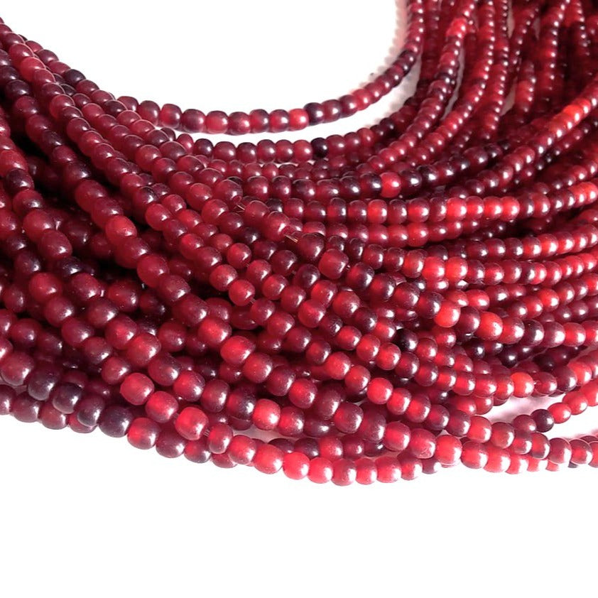 Perles rouges en corne naturelle 4-5mm