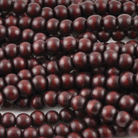 Perles de bois rondes bourgognes 6mm ou 8mm