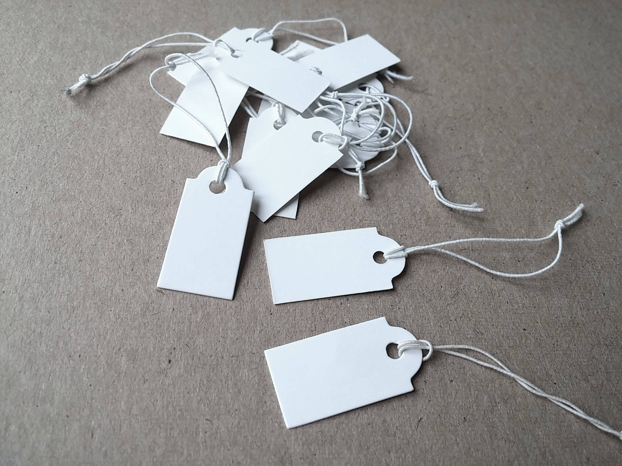 Not Returnable If Tag Is Removed White Jewelry Tag - 50 per Pack