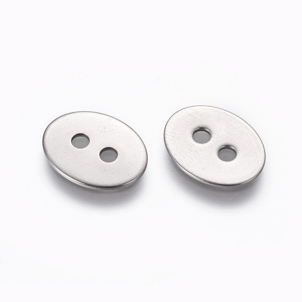 6 Stainless steel buttons or clasps, oval 17mm