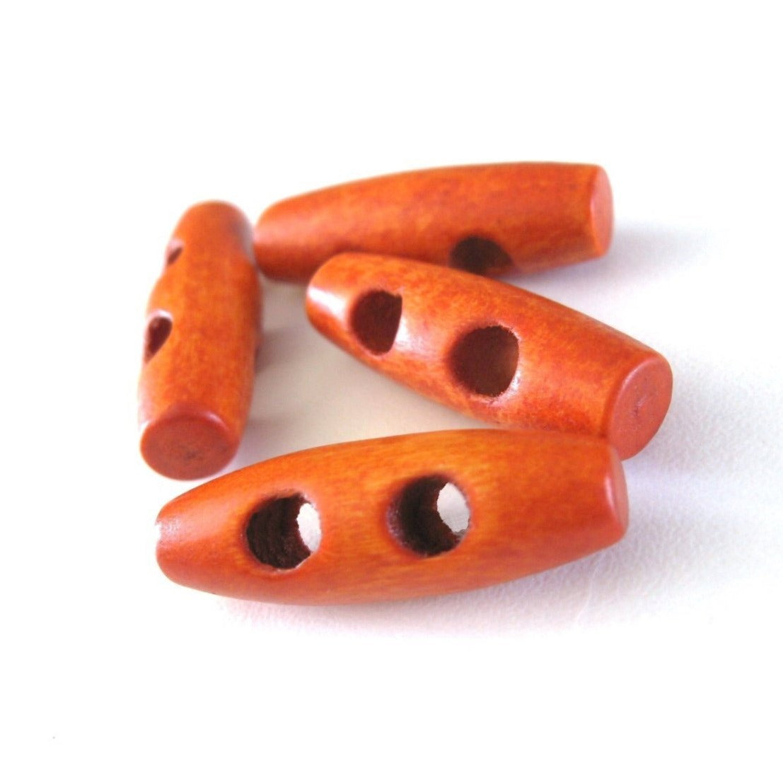 4 petits boutons de bois orange 3 x 1cm