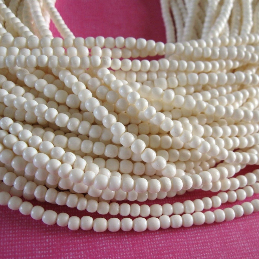 100 Perles rondes en os naturel blanc 3-4mm